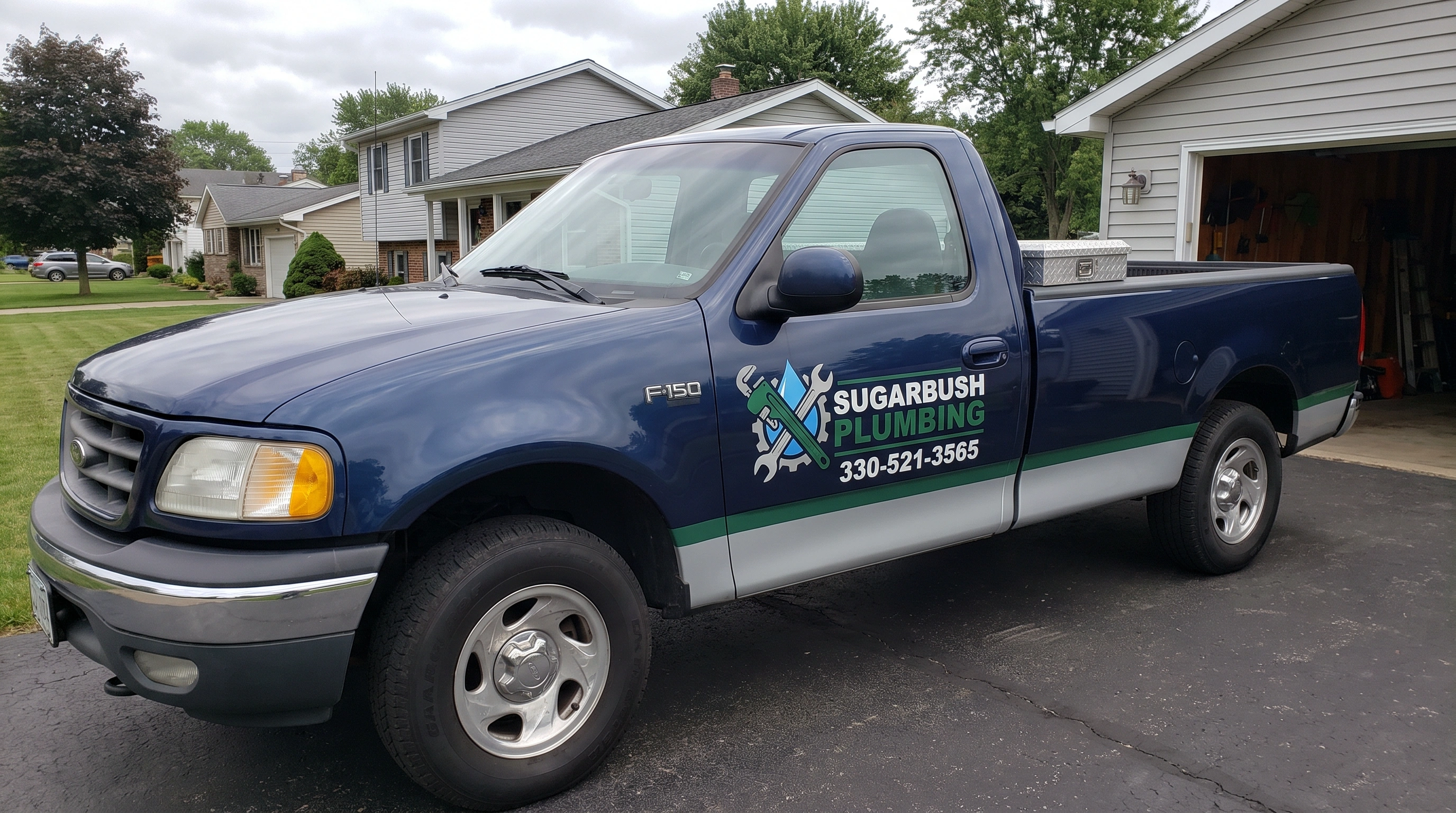 Sugarbush Plumbing technician working on plumbing in Canton, OH